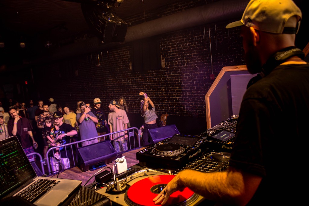 Andy Bruh at the decks, red vinyl