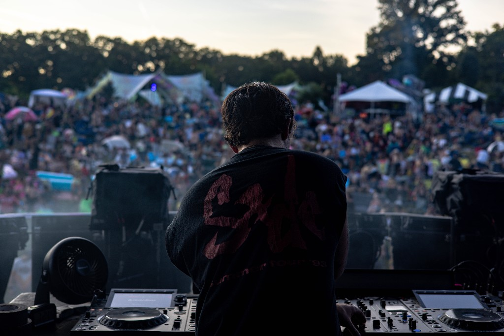 From the booth — Pioneer decks, crowd and tents