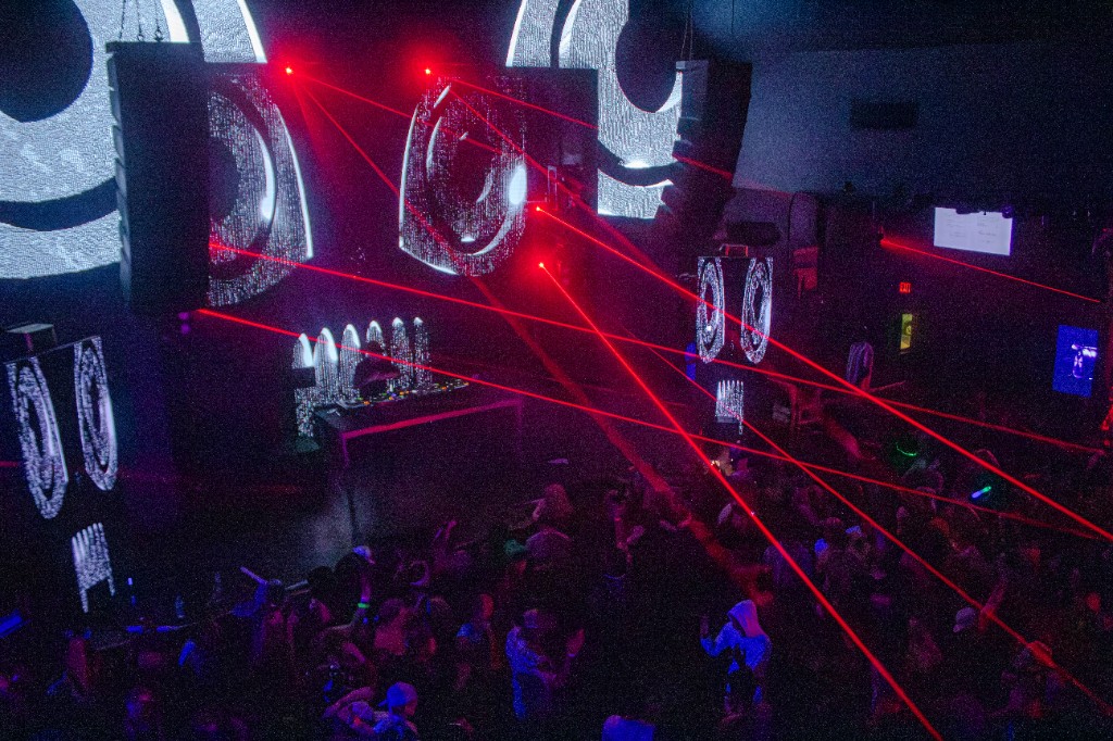From above — red lasers and skull screens over the crowd