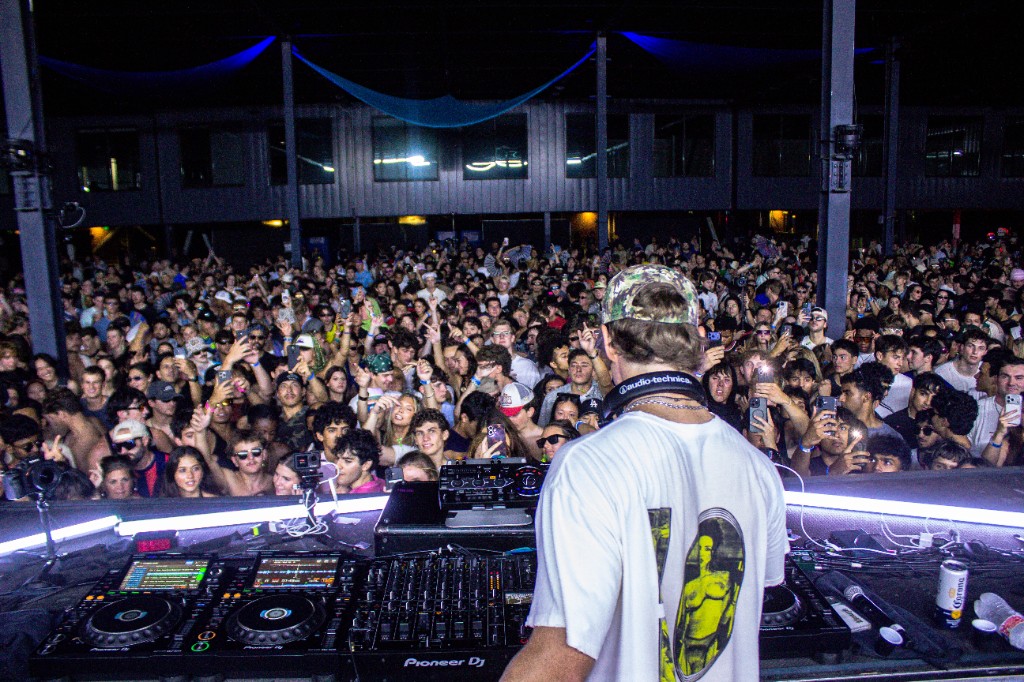 From the booth looking out — Pioneer decks, packed warehouse