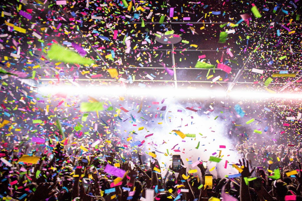 Confetti blast over the warehouse floor